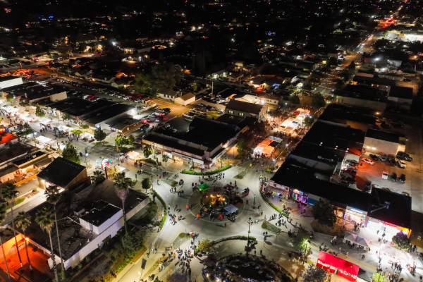 drone aerial shot of downtown palm springs at night